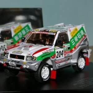 Skid SKM99039 MITHUBISHI PAJERO EVO OIL SHINOSUKA / MAGNE RALLYE PARIS DAKAR 1999 1/43 Modellino